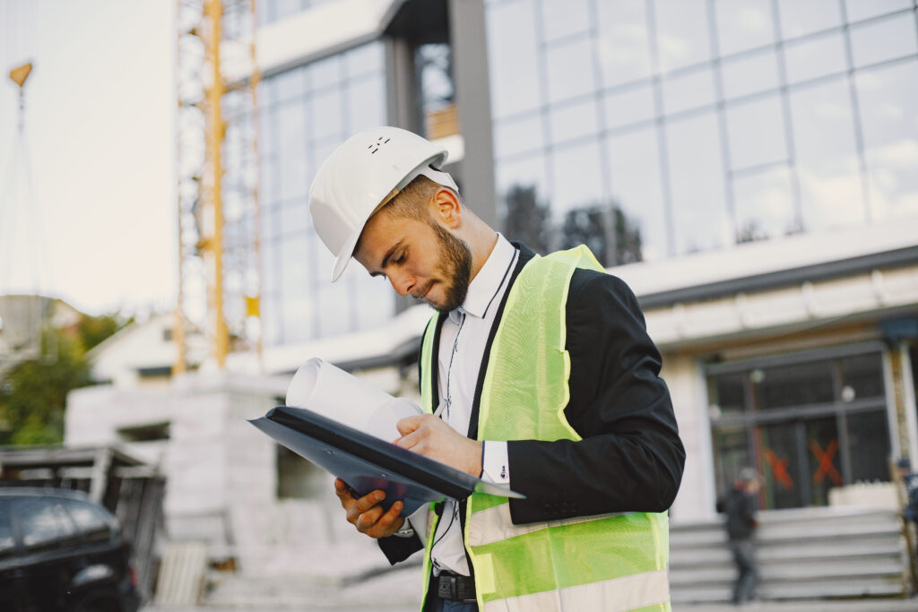 construction site manager reviewing project timeline UAE